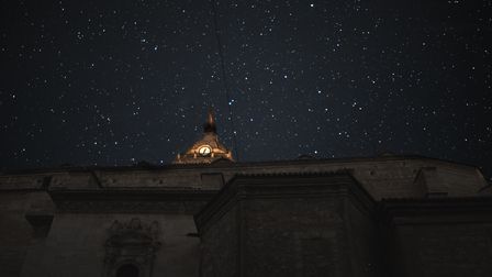 Cathedral at night with stars