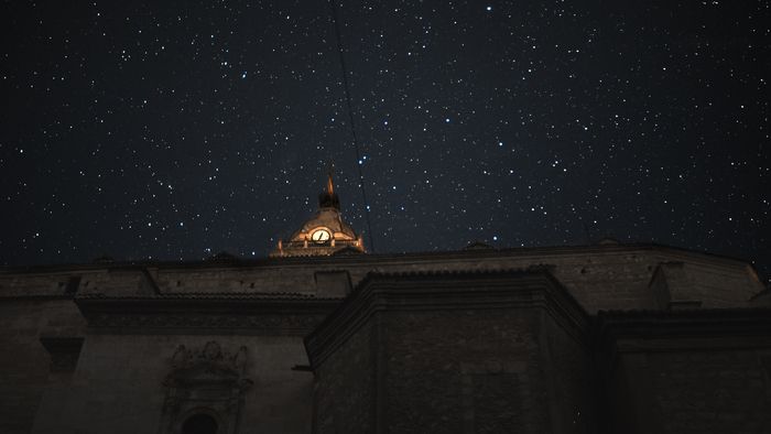 Cathedral at night with stars